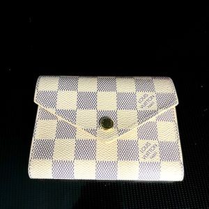 Louis Vuitton Victorine Wallet, brand new 
N64022